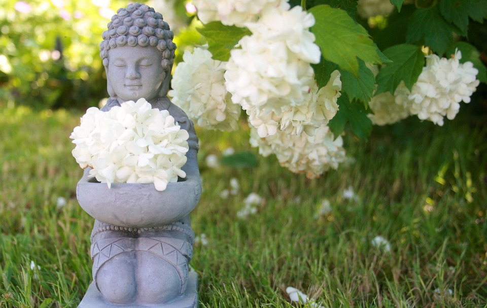 Buddha in flower garden